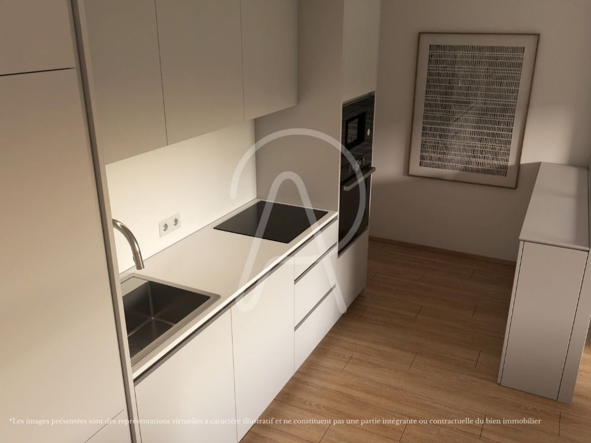 Cuisine équipée en mobilier laqué d'un T2 de Prestige Residence Porto Bonfim